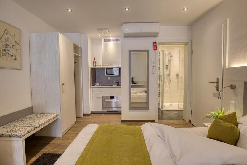 1-Zimmerwohnung (11) mit Internet, Klima, TV, Küchenzeile, DuscheWc, Waschmaschine, Trockner zimmer