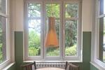 Ruhig gelegene 3-Zimmer-Wohnung mit Wintergarten auf großem Grundstück am Friedensberg