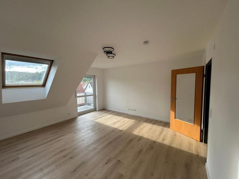 3 Zi-Dachgeschoßwohnung inklusvie TG Stellplatz zu vermieten