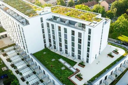 DONAU SIDE: Modernes Studio Apartment mit Terrasse, Fitnessstudio & Co-Working zimmer