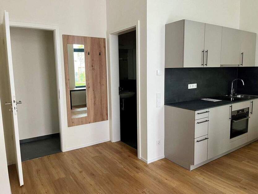 Loftige, möblierte 1-Zimmer-Wohnung mit großer Terrasse zum Erstbezug!