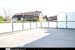 Luxuriöse 4,5-Zimmer mit großer Dachterrasse und Blick ins Grüne im Zweifamilienhaus