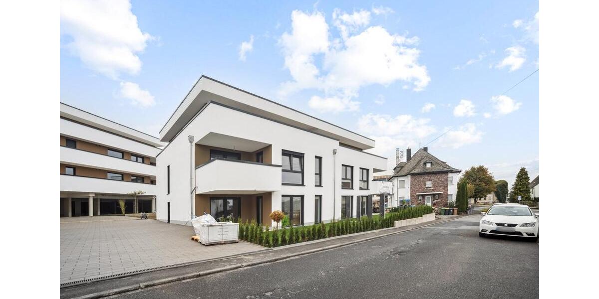 Erstbezug! Attraktive Erdgeschosswohnung in zentraler Lage zimmer