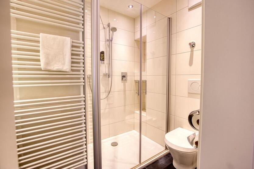 1-Zimmerwohnung (11) mit Internet, Klima, TV, Küchenzeile, DuscheWc, Waschmaschine, Trockner zimmer