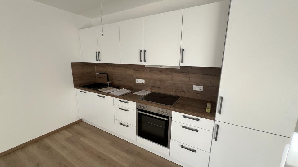 Neubau, 65qm mit Aufzug, EBK. Balkon, barrierefrei ab 1.3.26 2 zimmer