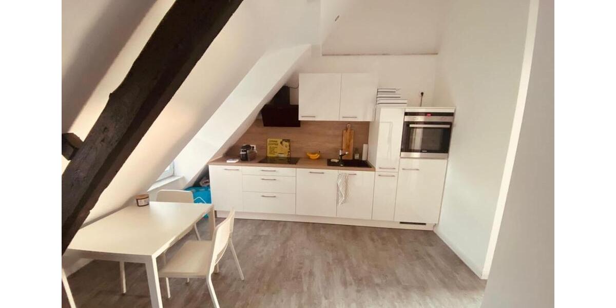 Traumhafte Dachgeschosswohnung mit Küche und E-Ladestation 2 zimmer