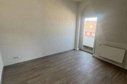 Besondere Dachgeschosswohnung mit Balkon zimmer