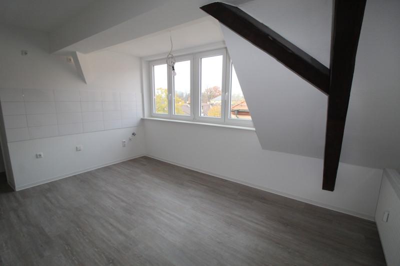 Perfekt für Singles - kleine DG-Wohnung mit Balkon und Fassadenvollwärmeschutz zimmer