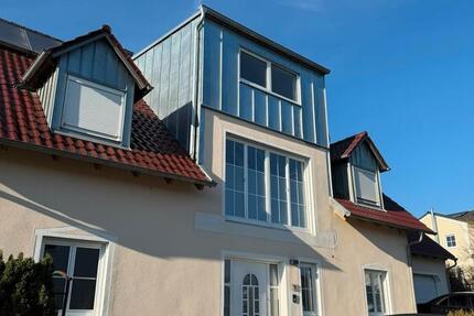 EG-Wohnung mit Garten, Garage & ausgebautem Untergeschoss 6 zimmer