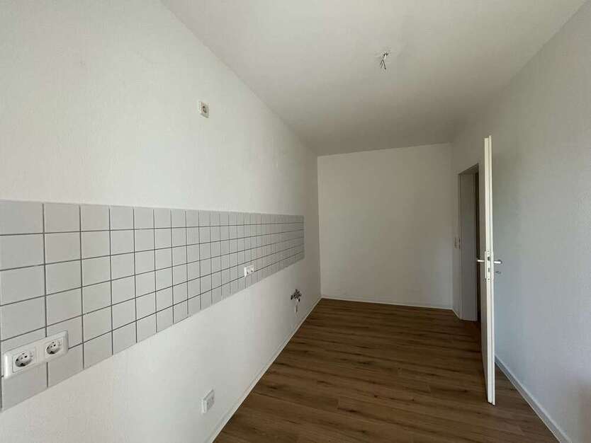 Sanierte Erdgeschoßwohnung mit Balkon!