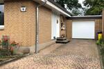 Einfamilienhaus mit Garten und Garage