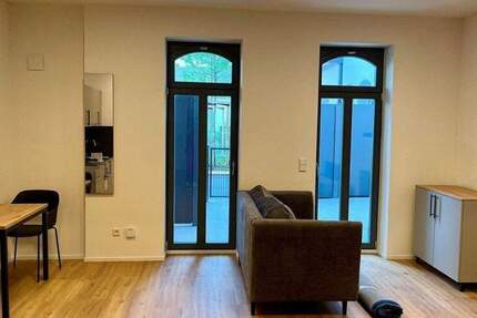 Loftige, möblierte 1-Zimmer-Wohnung mit großer Terrasse zum Erstbezug!