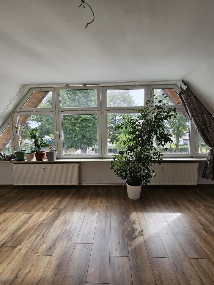 Individuelle Wohnung im Obergeschoss mit ausgebautem Dachgeschoss