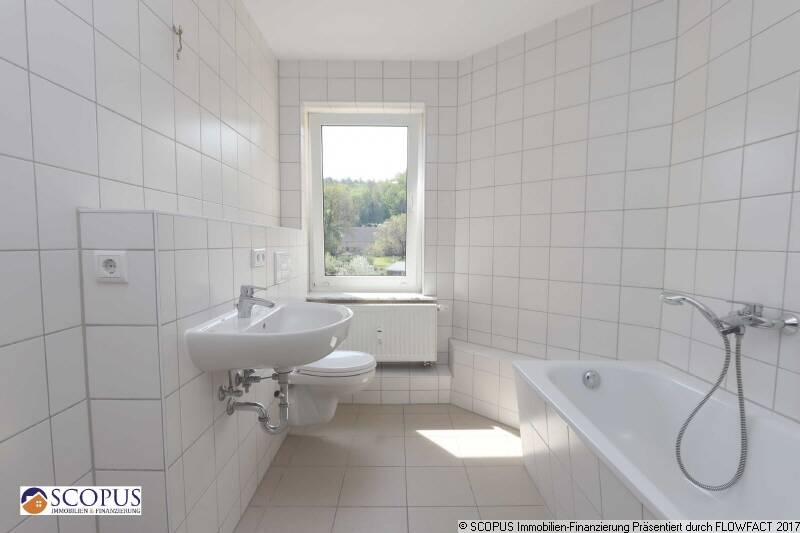 Helle Single-Wohnung mit Einbauküche, Gartenmitbenutzung, PKW-Stellplatz