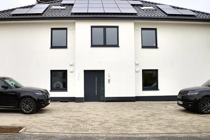 Exklusive 3 Zimmer Neubauwohnung KfW 40ee, Terrasse & Garten 3 zimmer