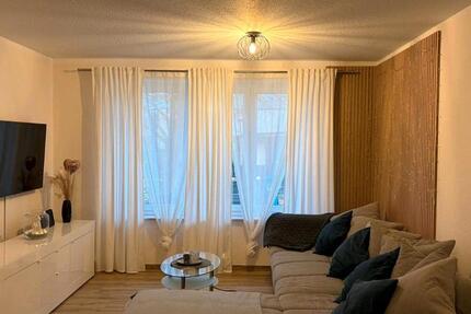 Wunderschöne 3-Zimmer Wohnung mit Garage, Terrasse und Garten 3 zimmer