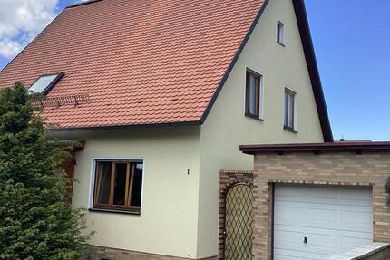 Einfamilienhaus mit Garten und Garage zu vermieten