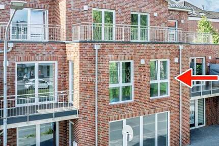 Moderne Obergeschosswohnung mit Balkon - Erstbezug im Stadtkern von Papenburg 2 zimmer