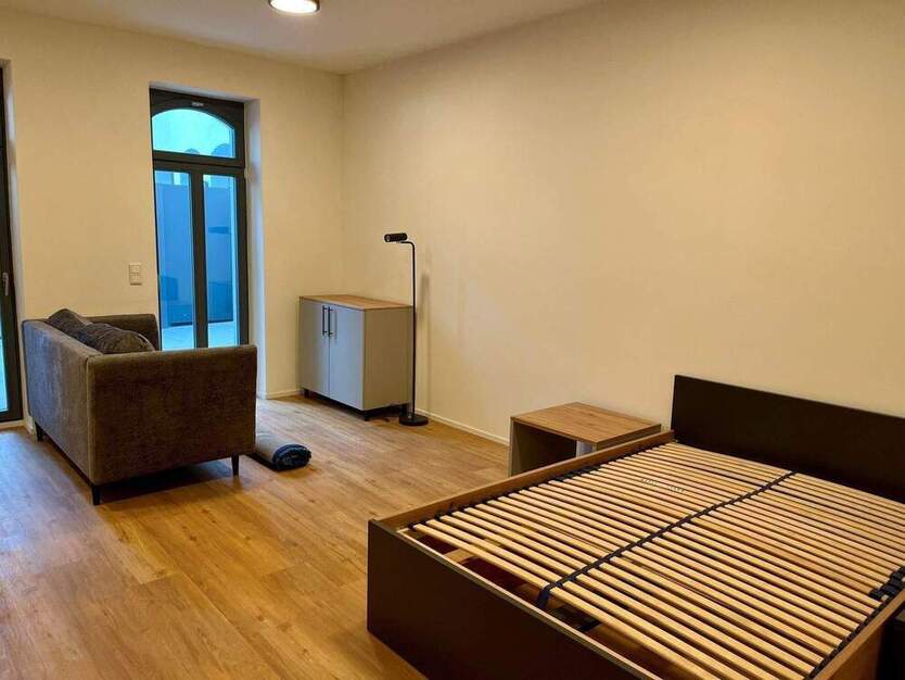 Loftige, möblierte 1-Zimmer-Wohnung mit großer Terrasse zum Erstbezug!