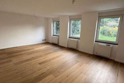 Moderne, kernsanierte 1,5-Zimmer-Wohnung mit großer Dachterrasse zum Innenhof 1 zimmer