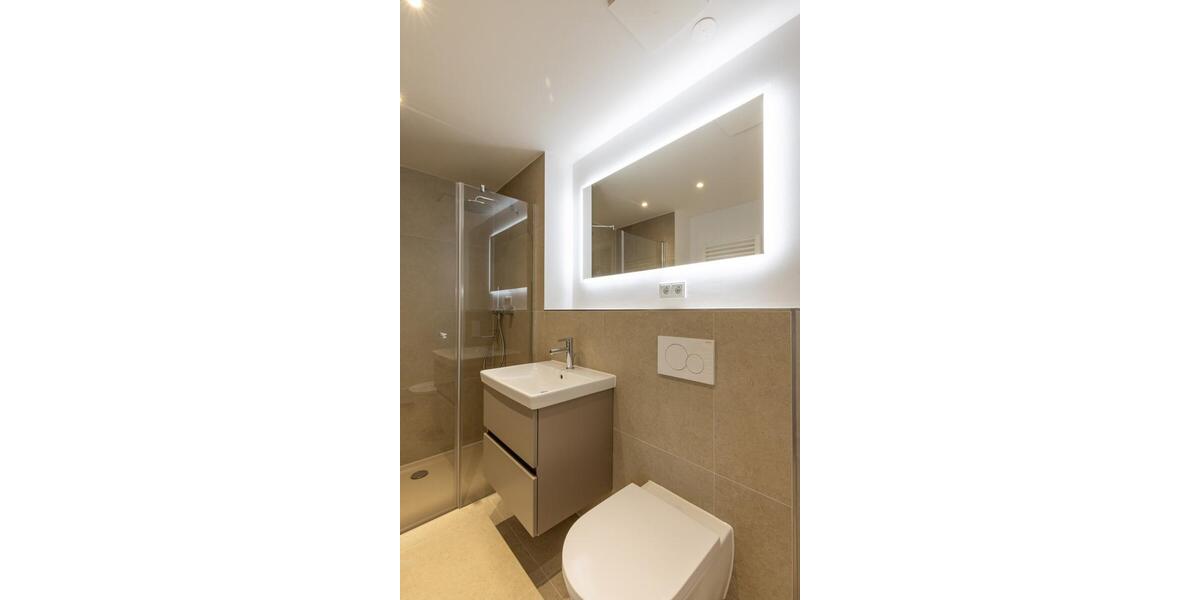 Erstbezug: 2-Zi-Gartenwohnung mit Einbauküche, 2 Terrassen und TG-Einzelstellplatz 2 zimmer