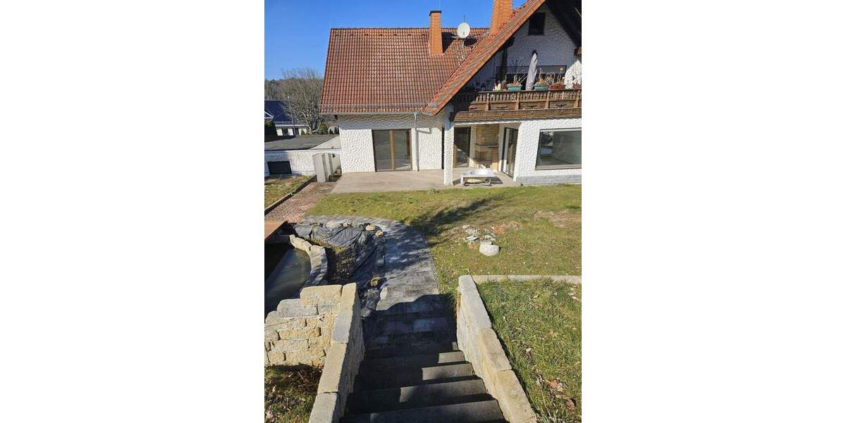 Hauptwohnung in Zweifamilienhaus mit Garage und Werkstattraum 4 zimmer