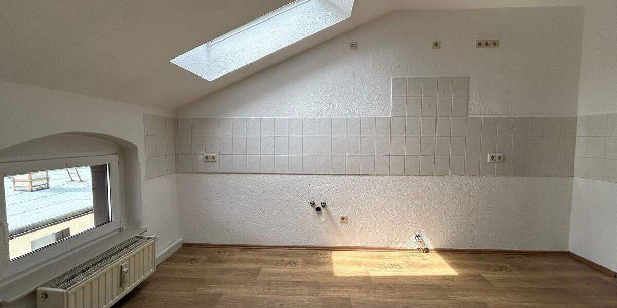 gemütliche, kleine 3,5-Raum-Wohnung im DG mit Garten 2 zimmer