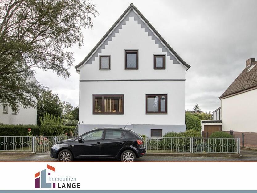 Hochparterre-Wohnung mit Gartenanteil