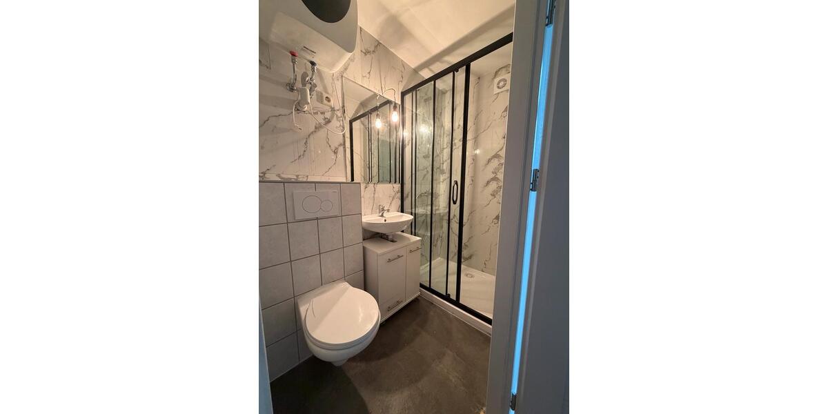 1 Raumwohnung im Erdgeschoss mit Balkon und Einbauküche 1 zimmer