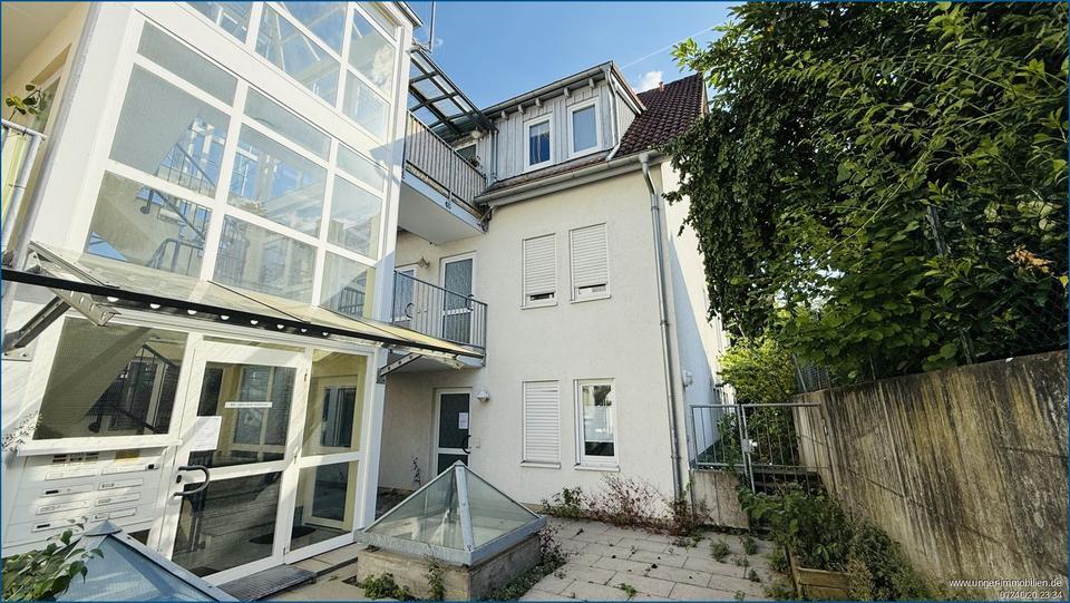 Moderne 3-ZimmermaisonetteWohnung mit Balkon und Blick ins Grüne mit TG-Stellplatz!