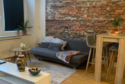 1-Raum-Loftwohnung mit Wlan, TV, DuscheWC, Küche, Parkplatz, Waschmaschine und Terasse zimmer