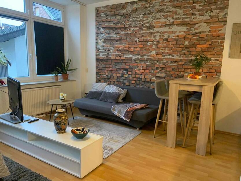 1-Raum-Loftwohnung mit Wlan, TV, DuscheWC, Küche, Parkplatz, Waschmaschine und Terasse zimmer