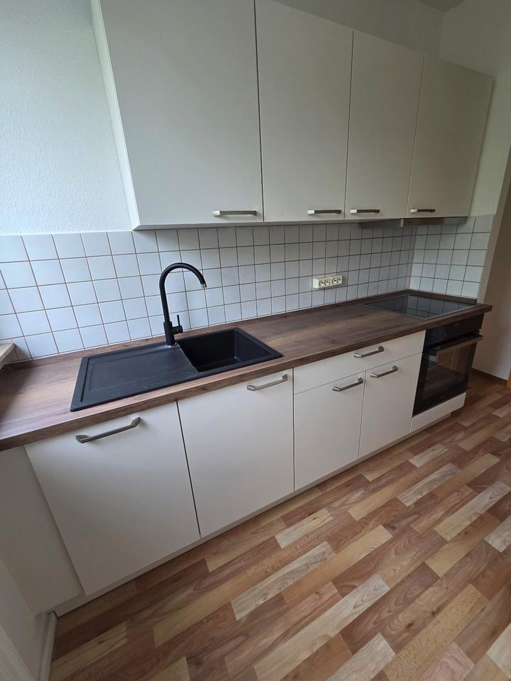 Wohnung mit großem Balkon und Einbauküche