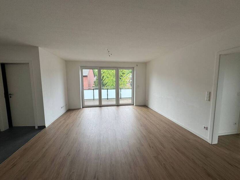 Moderne Dachgeschoßwohnung mit Balkon & Garagenstellplatz im Herzen von Harsewinkel