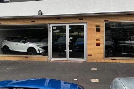 AutohausAutohandel + Halle und Außenstellfläche zimmer