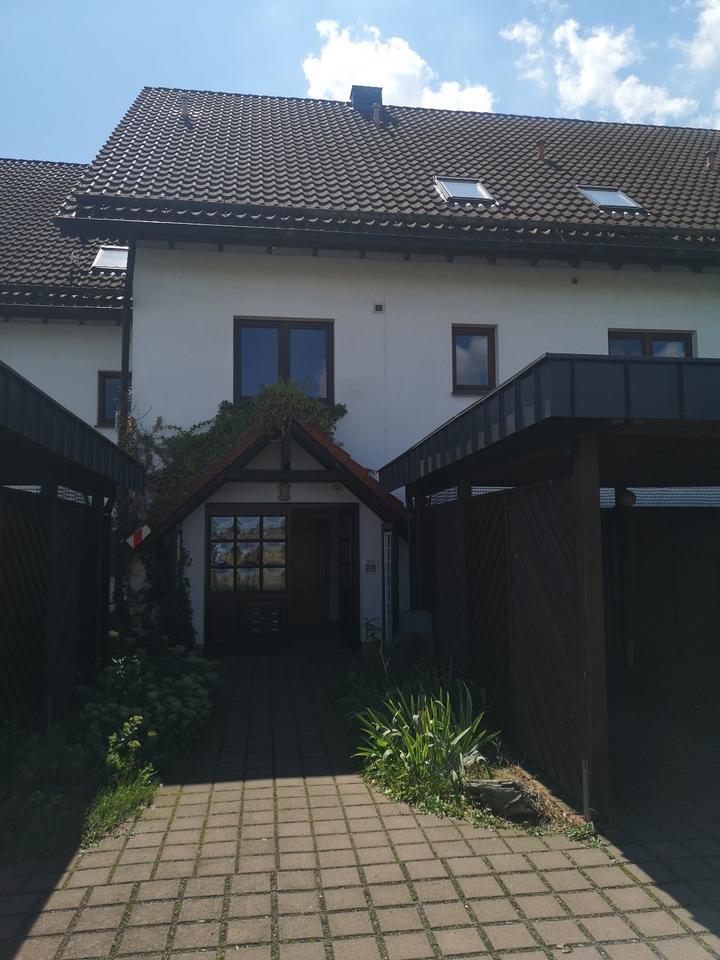 3-Zimmer Wohnung mit Wintergarten und Gartenanteil