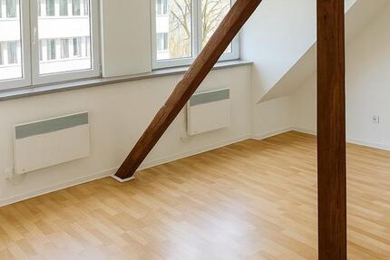 Moderne Dachgeschoßwohnung mit authentischen Sichtbalken – Erstbezug nach Sanierung