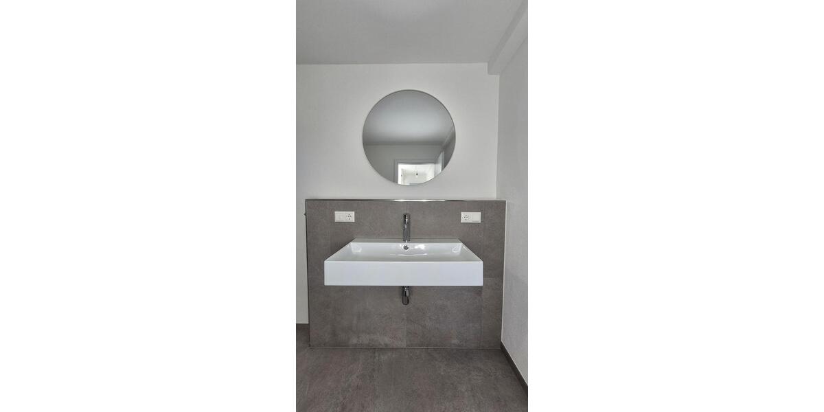 Exklusiver Erstbezug: EG-Wohnung mit wundervollem Erker, riesiger Hochterrasse und Südgarten 3 zimmer