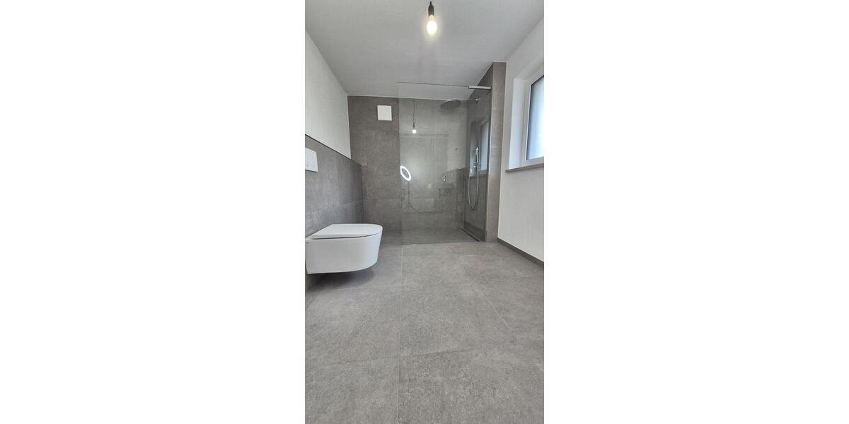 Exklusiver Erstbezug: EG-Wohnung mit wundervollem Erker, riesiger Hochterrasse und Südgarten 3 zimmer