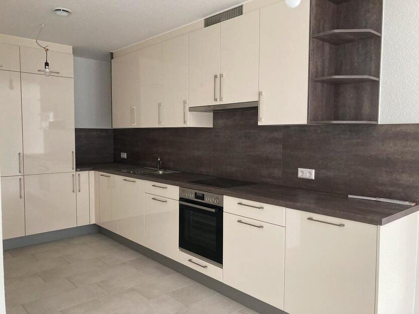 Erstbezug - Ilsfeld: 2-Zi.-Wohnung m. EBK, Garten und Stellplatz