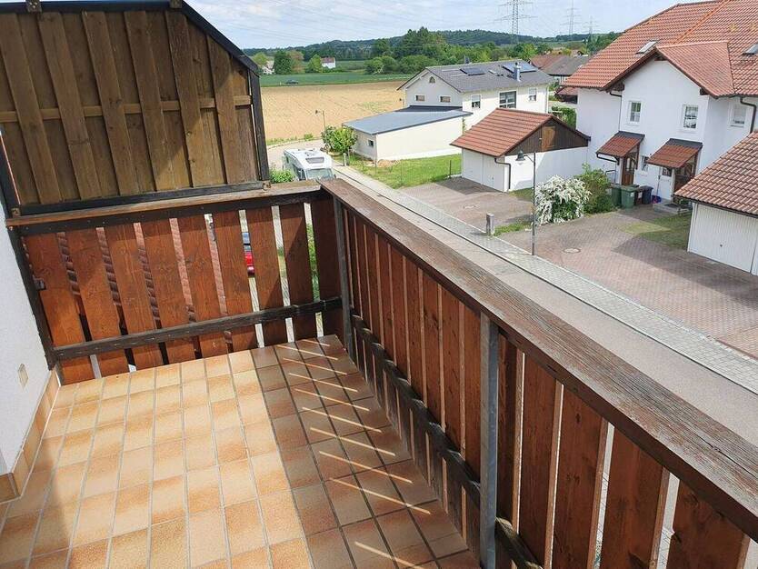 Dachgeschoss-Apartment mit Balkon
