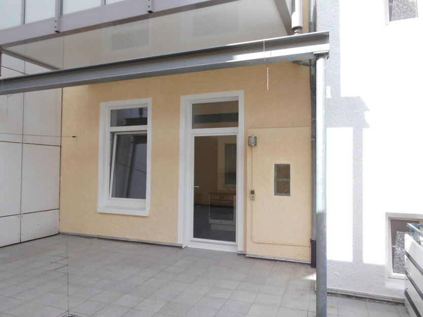 Zentrale 3-Zimmer-Wohnung mit EBK und Dachterrasse