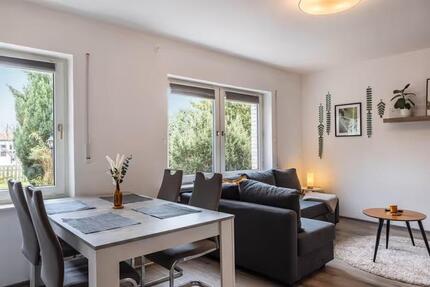 Vollmöblierte 2-Zimmer-Erdgeschosswohnung mit Terrasse & Garten zimmer