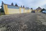 Pfeilerfreie Lagerhalle mit 2 Rolltoren, Büro, Lager, Teeküche, WC & zusätzl. Freifläche zimmer
