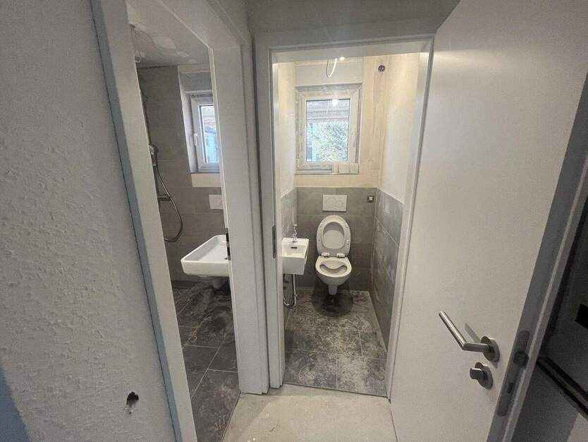 Traum für Paare und Familien! Kernsanierte 3,5 Zimmer mit Garten, Garage und Balkon 3 zimmer