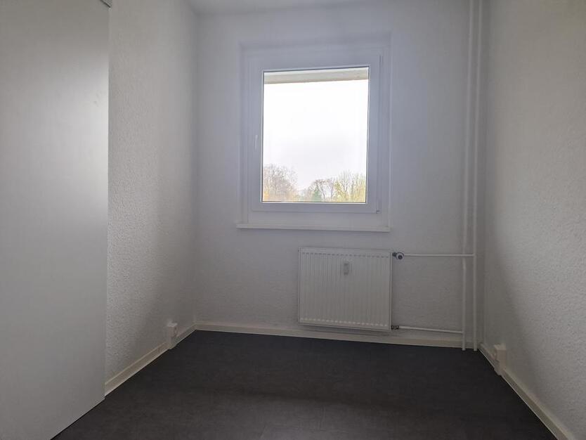 Charmante Erdgeschoßwohnung mit Balkon und separater Küche !