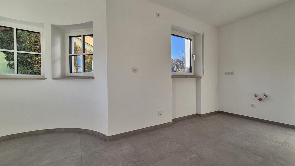 Exklusiver Erstbezug: EG-Wohnung mit wundervollem Erker, riesiger Hochterrasse und Südgarten 3 zimmer