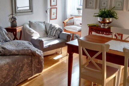 Schöne, zentral gelegene 4-Zimmer-MansardenWohnung mit ca. 300 m² Gartenanteil