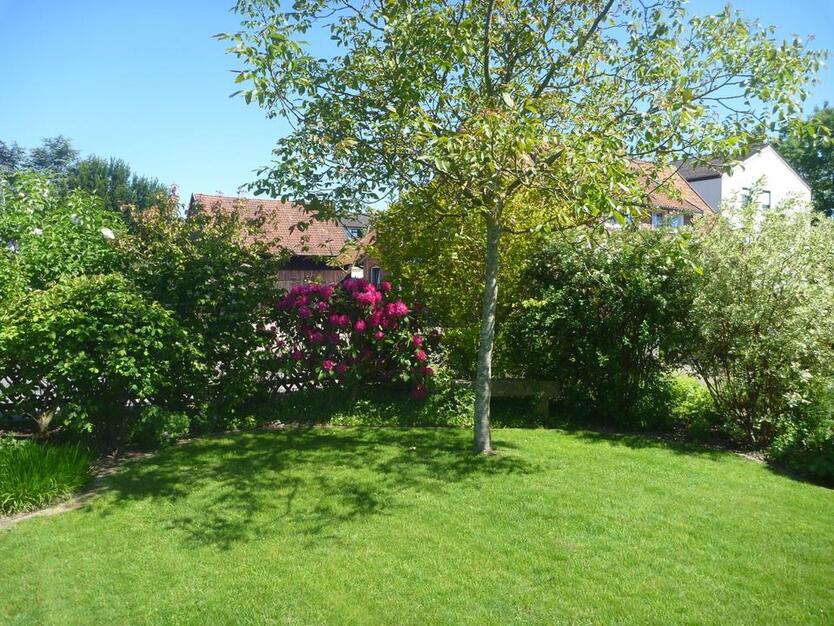 Wohnung im Erdgeschoss + Wintergarten + Garage + Garten