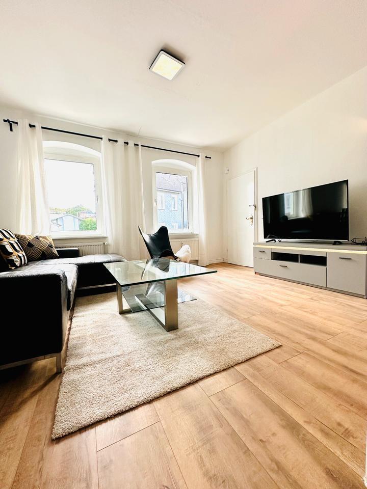Exklusives Wohnen auf Zeit: Stilvolle Parterre-Wohnung mit luxuriösen Details und zentraler Lage